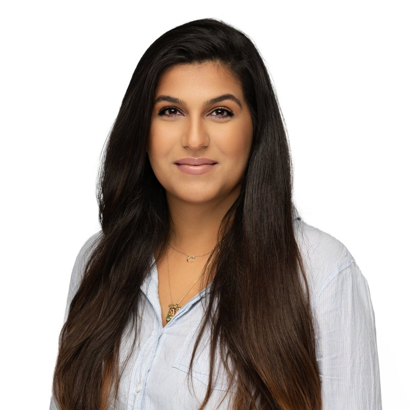 Dees Insurance studio headshot on a white background — pale striped blouse