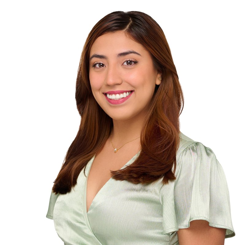 Dees Insurance studio headshot on a white background — light green blouse