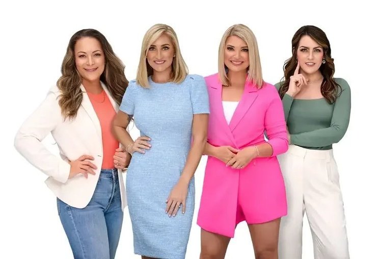 Coordinated team portrait of four women
