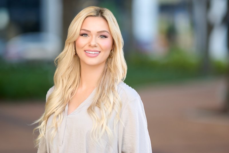 Zarghami Group portrait in downtown Sarasota — light blouse