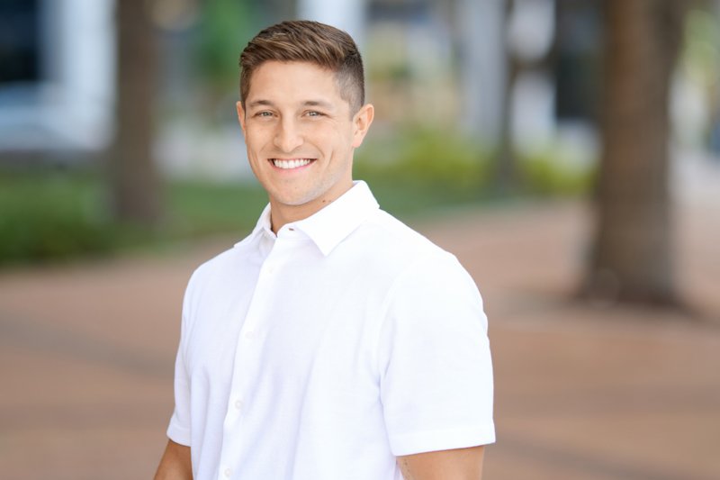 Zarghami Group portrait in downtown Sarasota — white polo shirt